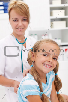 Little girl at the doctor for a checkup