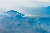 Volcano top under sky, bird's eye view. 