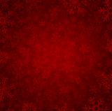 red winter background with beautiful various snowflakes