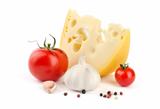 Cheese, tomatoes and garlic isolated on white background