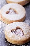 closeup of christmas cookies and sugar powder 