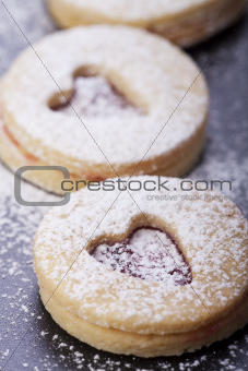 closeup of christmas cookies and sugar powder 