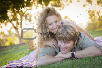 Happy Attractive Loving Couple Portrait in the Park.