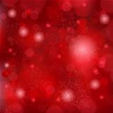 Beautiful soft red snowflake background with bokeh lights