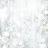Glittering silver Christmas background with blurred lights