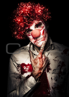 Evil Blood Stained Clown Contemplating Homicide