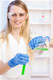young woman doing experiment in laboratory