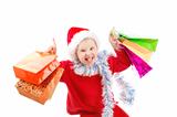 Child dressed as Santa with presents