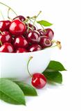 fresh cherry berries with green leaf