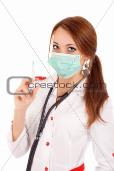Young doctor holding syringe