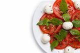 part of the plate with salad Caprese