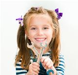 smiling girl with spanners