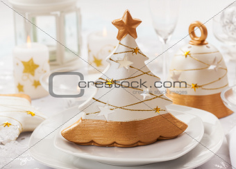 Festive table for Christmas with small tree