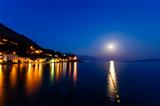 Small Dalmatian Village and Adriatic Sea Bay Illuminated by Moon
