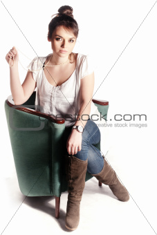 Girl in a green chair