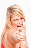 angry young woman pointing her finger at the camera - isolated on white