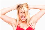 angry, frustrated girl with hands in her hair screaming - isolated on white