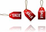 Red hanging tags with the word sale. Shopping labels