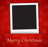 Merry Christmas card template with blank photo frame on the red