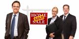 Businessmen and Businesswoman with Sold Home For Sale Real Estate Sign Isolated on a White Background.
