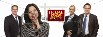Pretty Hispanic Woman and Other People Behind in Front of Sold Home For Sale Real Estate Sign Isolated on a White Background.