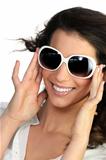 Young woman in oversized sunglasses