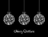 Three White Christmas balls on black background.