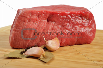 Raw Beef on wooden board