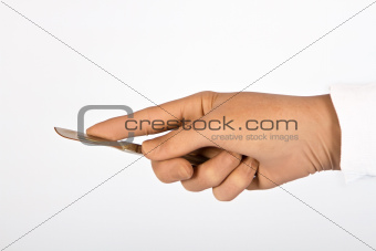 Surgeon holding scalpel in hand