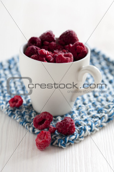 Fresh raspberries in cup