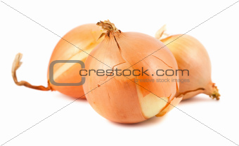 Three fresh golden onions