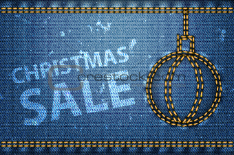 Christmas sale words on blue jeans background
