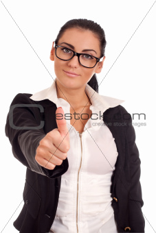 Young woman in glasses gesturing OK