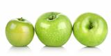 Three green apples isolated