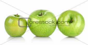 Three green apples isolated