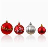 Collection of four Christmas balls on white