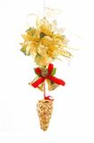 christmas decoration with cone , bells and golden flower