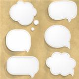 Cardboard Structure With White Paper Speech Bubbles