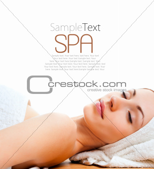 young woman lying relaxed in the spa