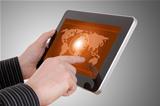 Digital world concept graphic, including digital map on tablet , on businessman hands