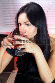woman with glass of brandy ll