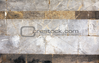 Wall of marble blocks