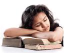 Indian Girl tired and sleeping  with books