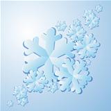 Winter background. Blue paper snowflakes with shadows.