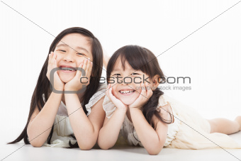 happy two asian girls  on the white background