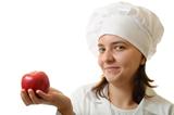 Smiling chef with an apple