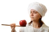 Chef with apple and wooden spoon