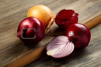 Ripe red and gold onions.