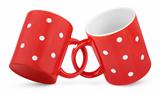 Two coupled red polka dot mugs
