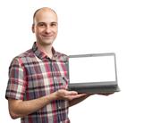 smiling man with laptop computer